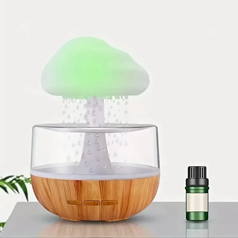CasaLoom rain cloud humidifier and aromatherapy diffuser with wood-grain base and essential oil bottle